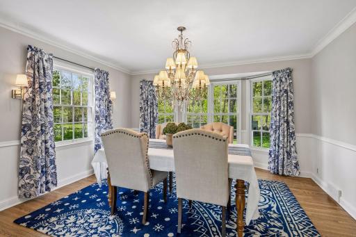 Bayed formal dining room, flooded with sunshine views