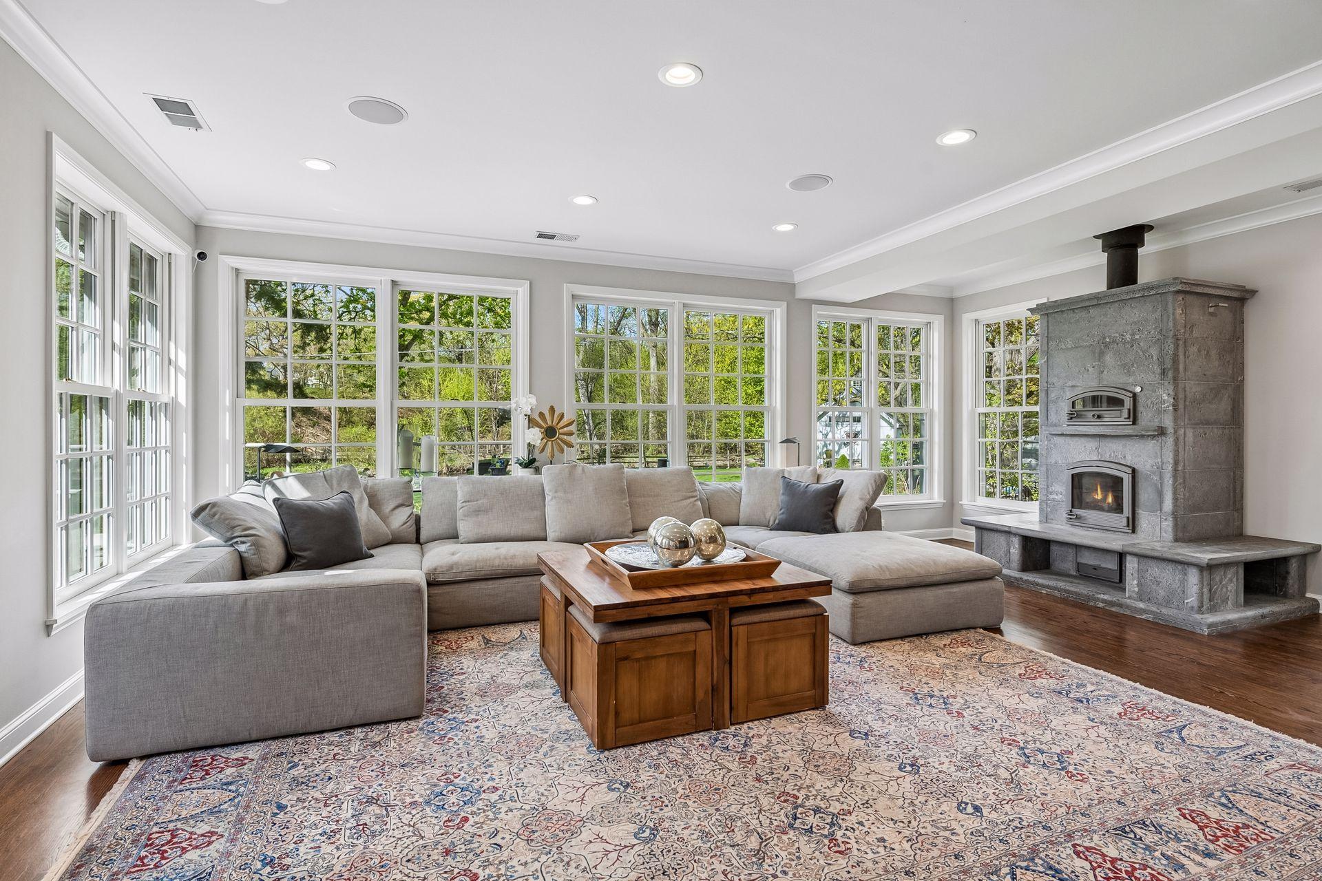 Massive family room with Tulikivi fireplace and oven