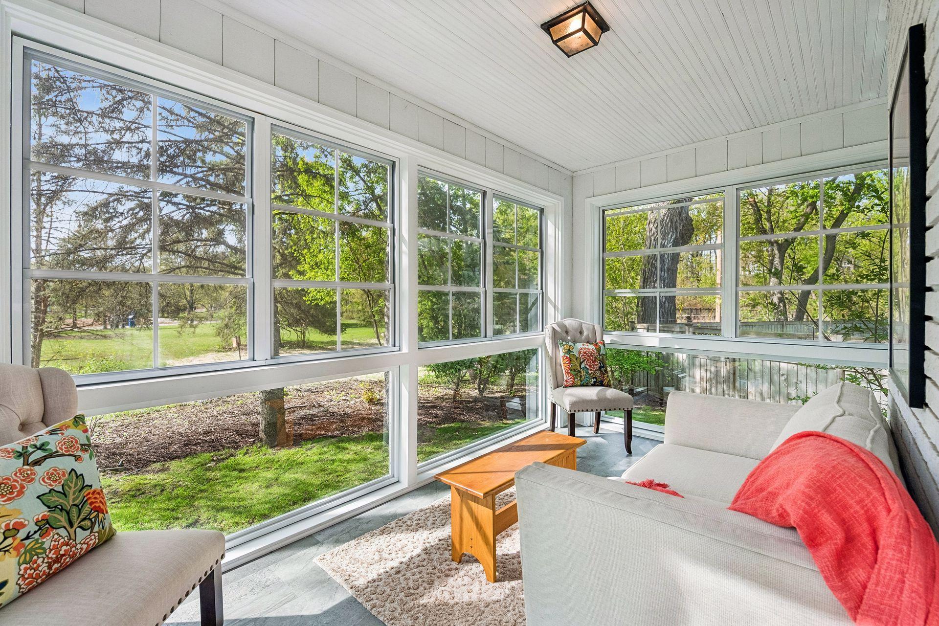 Renovated 3 season porch with views of park and nature