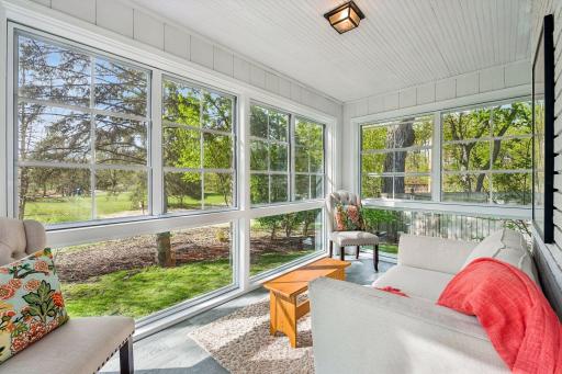 Renovated 3 season porch with views of park and nature
