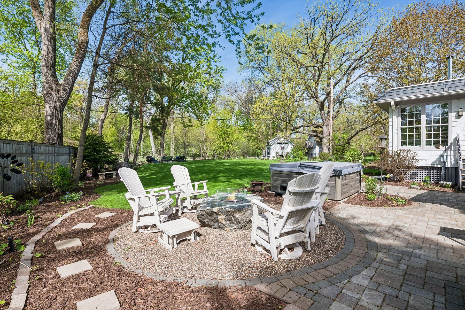 Over half an acre overlooking park, creek, truly a playland