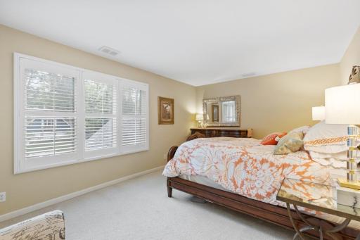 Inviting upper-level second bedroom with great natural light.