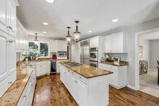 Large center island with a built-in cooktopâideal for prepping and entertaining.