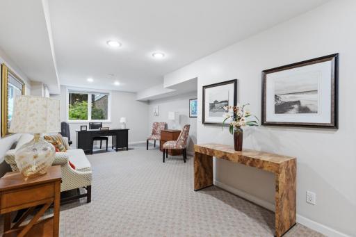 Spacious lower-level flex space featuring recessed lighting and endless possibilities.