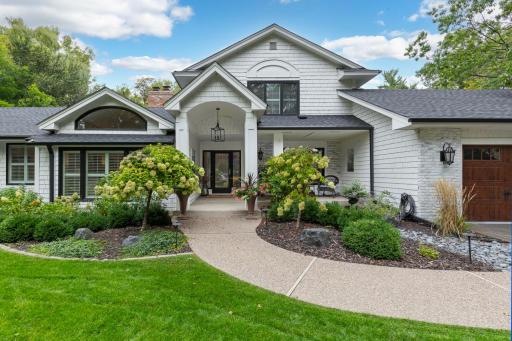A warm, welcoming front porchâperfect for morning coffee.