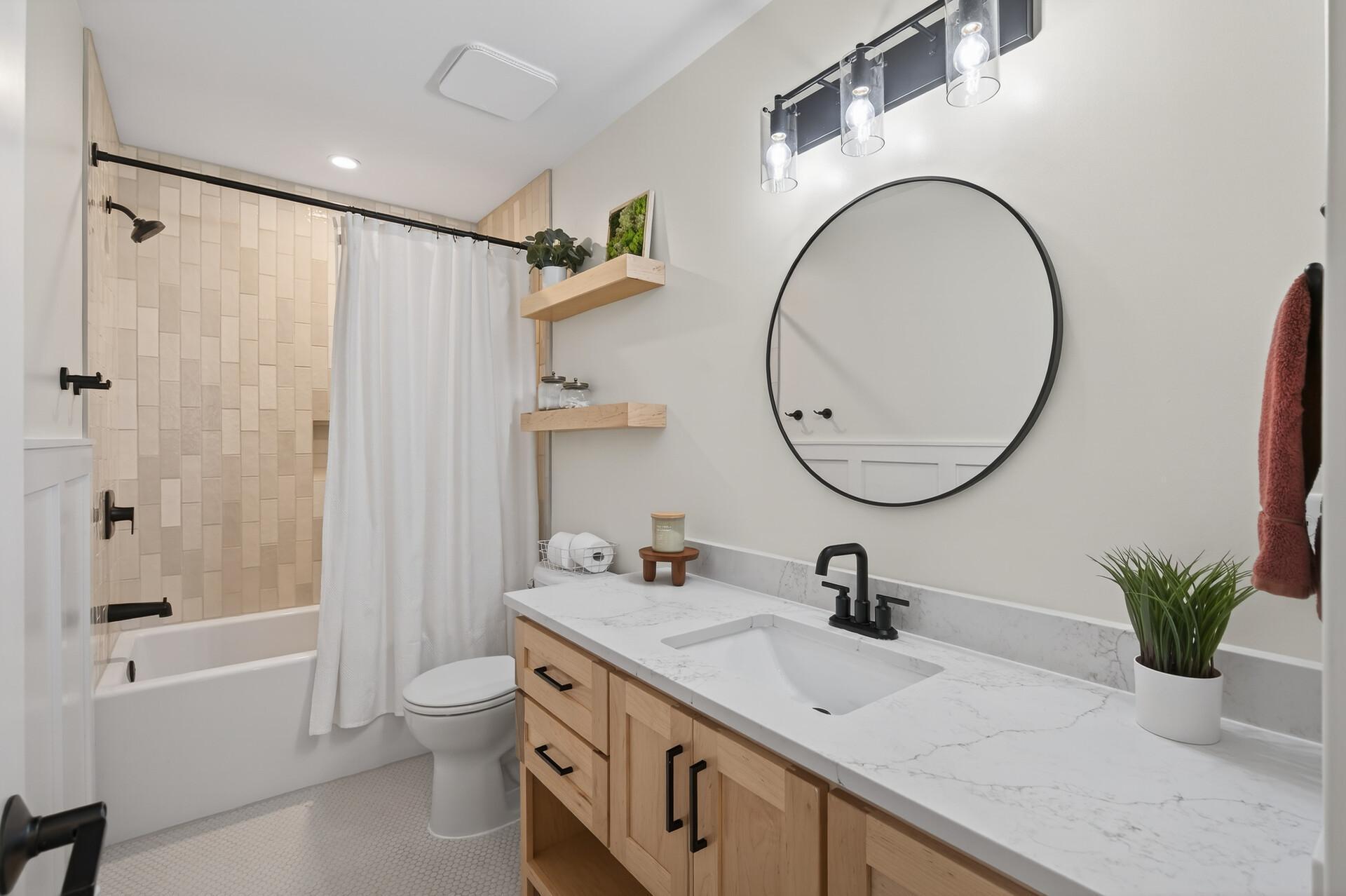 Main Level Full Bathroom with Amish Built Vanity and Tile Tub/Shower