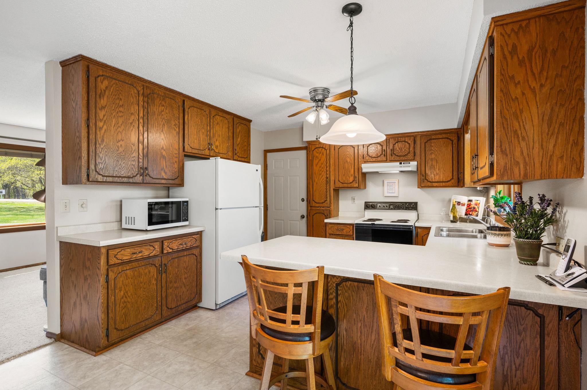 Additional view of kitchen with breakfast bar