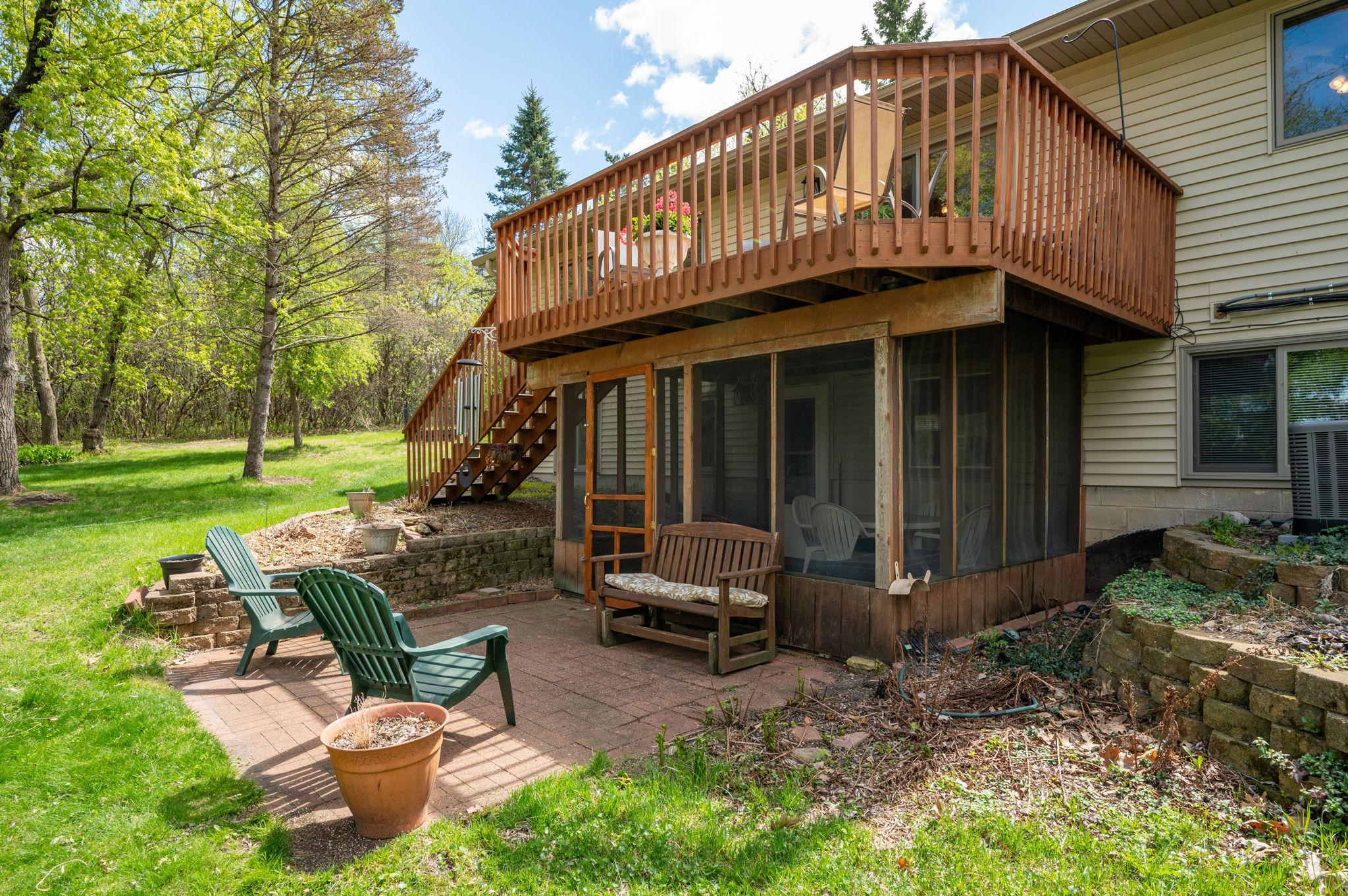 View of Screened porch and stairs to deck!