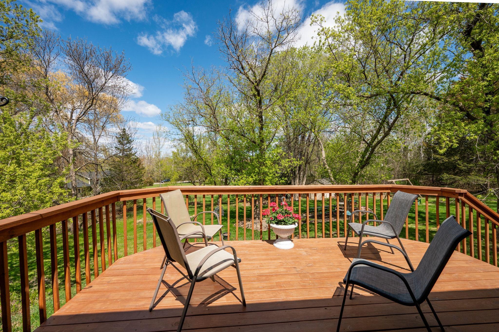 Private deck with views of the 1+ acre heavily wooded lot!