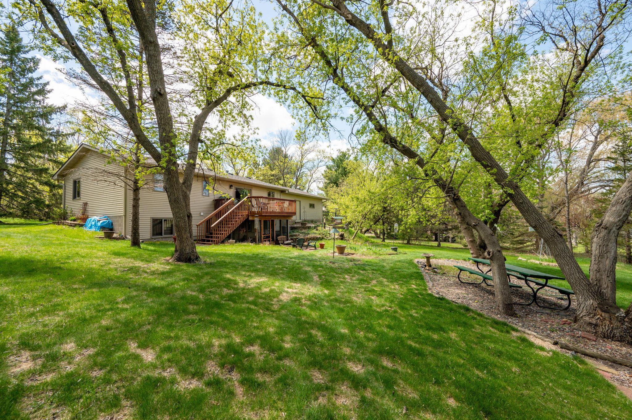 View of back yard and rear view of home