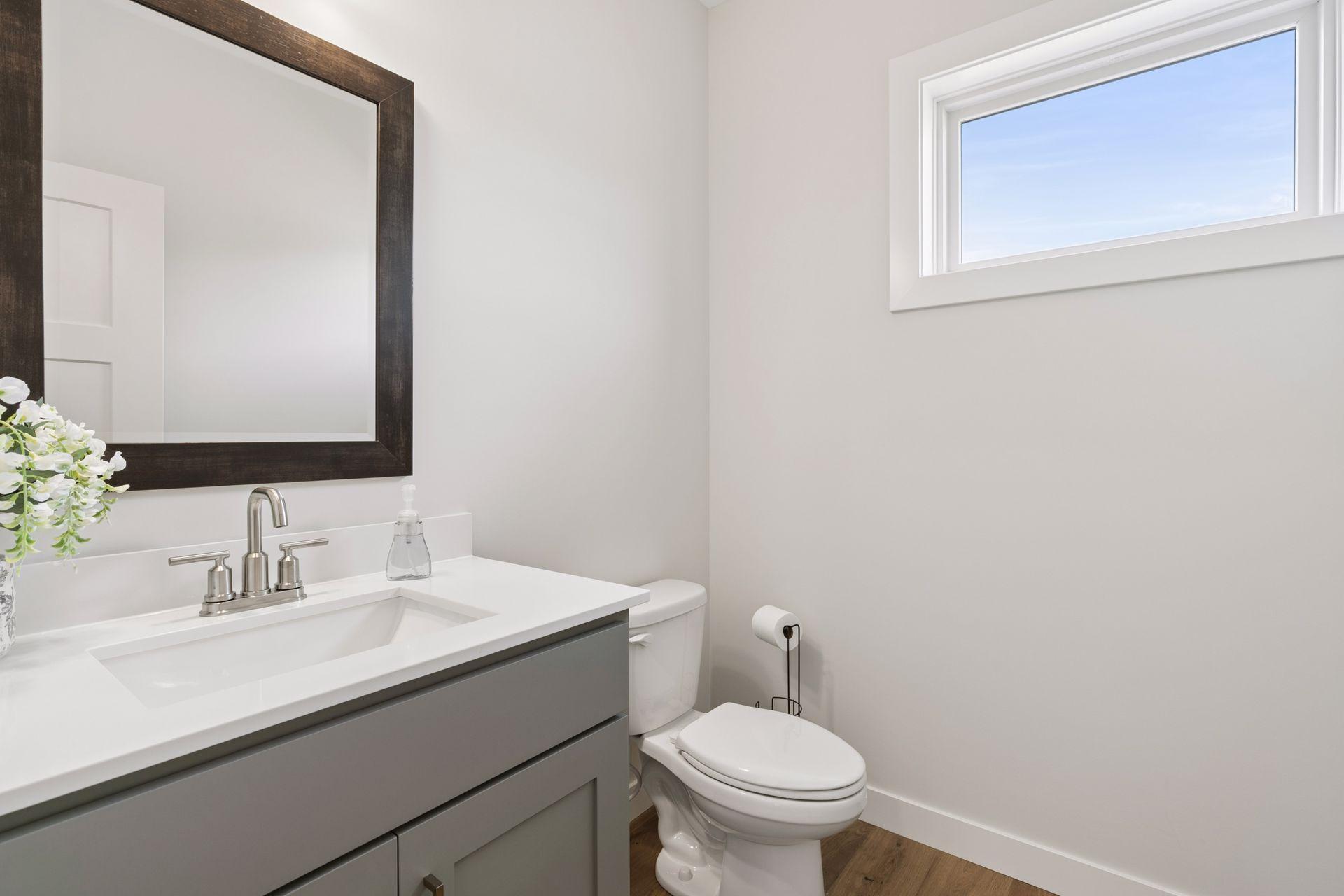 Main floor 1/2 bath with vanity