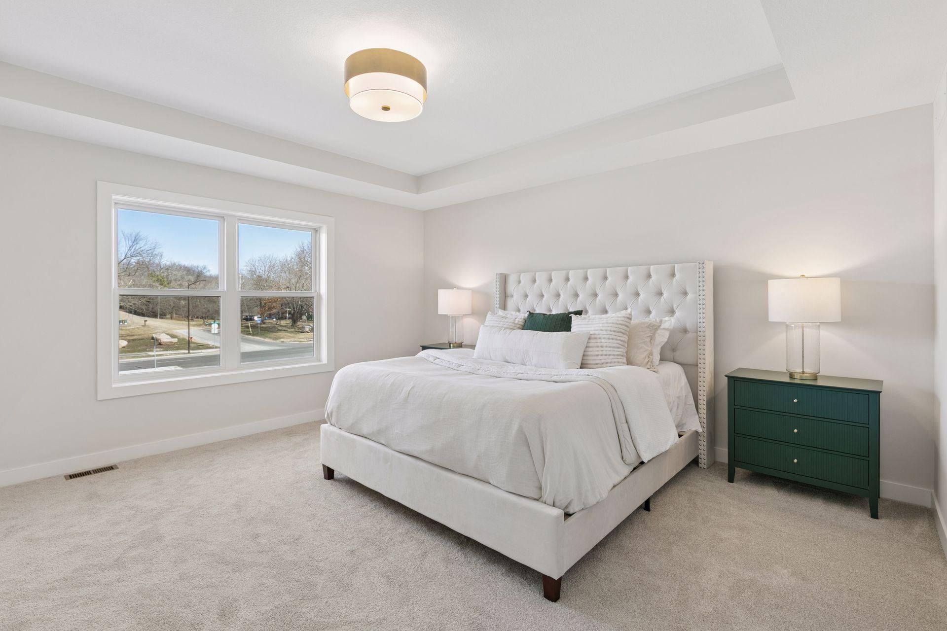 Primary bedroom with box vaulted ceiling