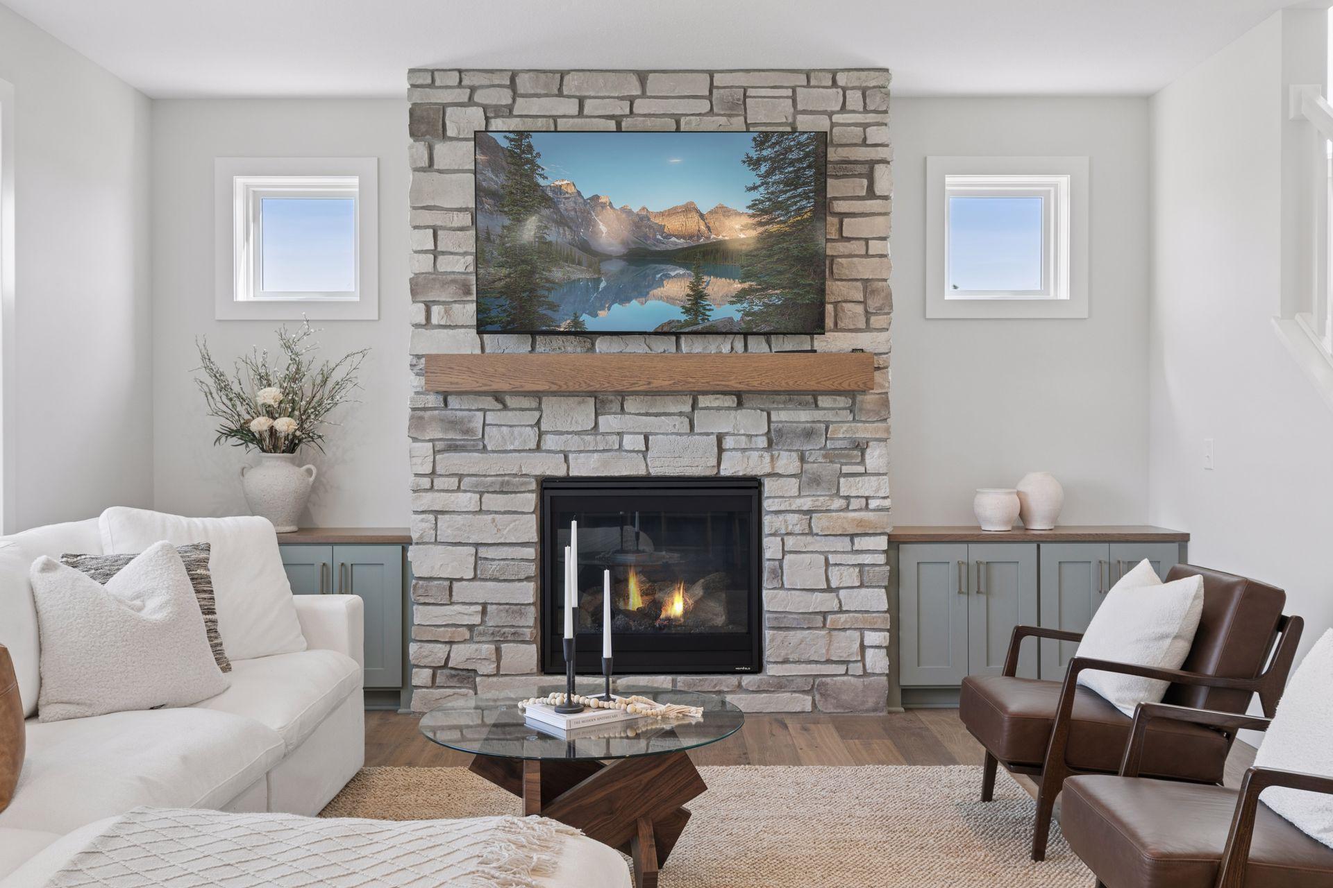Gas burning fireplace with stone to the ceiling
