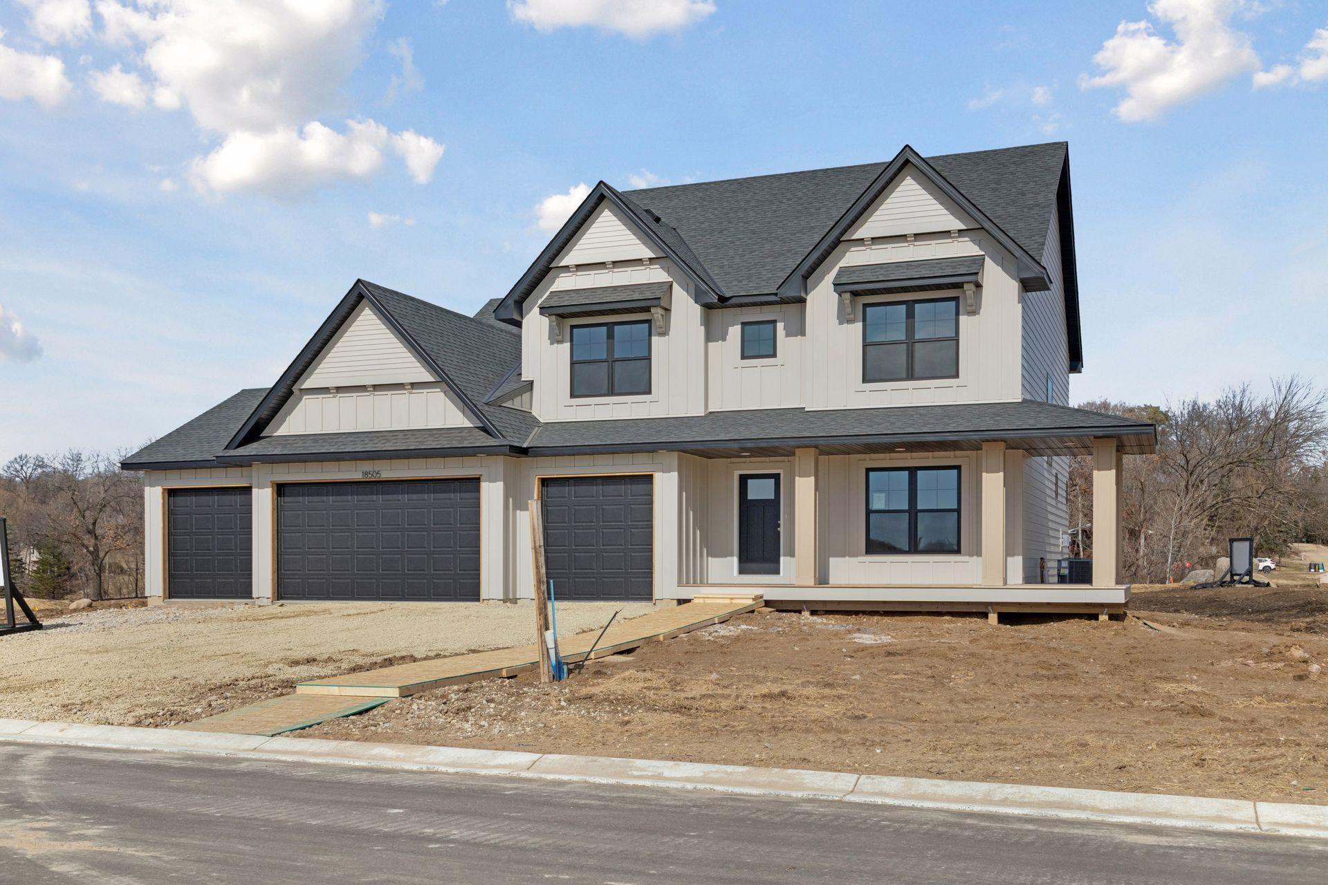 4 car garage & wrap around front porch