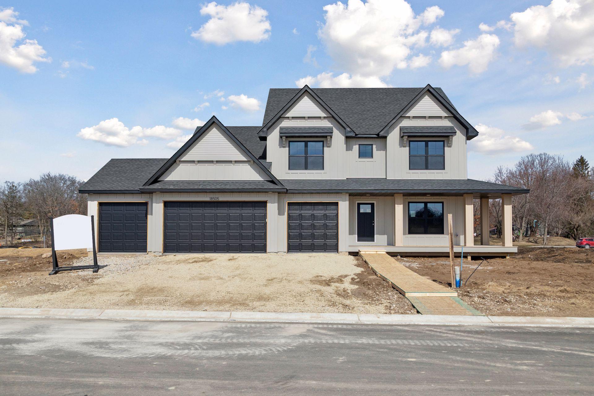 Current front exterior with James Hardie on all 4 sides- just waiting for warmer weather to add landscaping
