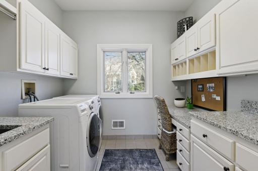 The Laundry Room and Command Center share a space adjacent to the Kitchen.