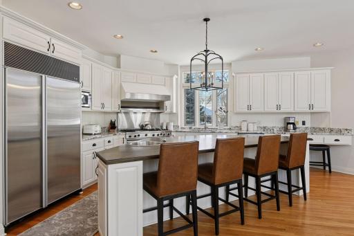 The large walk-in pantry is located to the right of the kitchen cabinets (not shown)