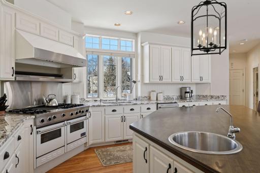 The kitchen window overlooks the front yard.