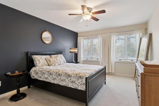 The second bedroom on the upper floor also overlooks the back yard..