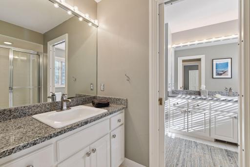 A walk-through 3/4 bathroom connects to both the 4th Bedroom and corridor. A pocket door can separate a sink and shower from the 2nd sink and commode.