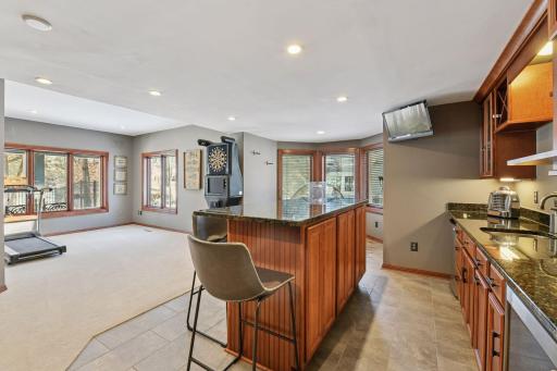The billiards room currently houses the homeowner's treadmill.