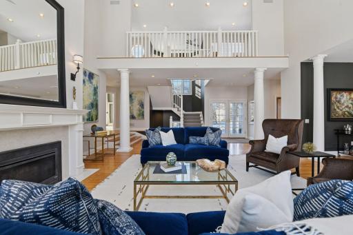 A catwalk on 2nd floor overlooks the Great Room and connects two bedrooms upstairs, each with a bathroom en suite.