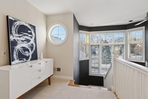 The windows in the staircase face the front yard.