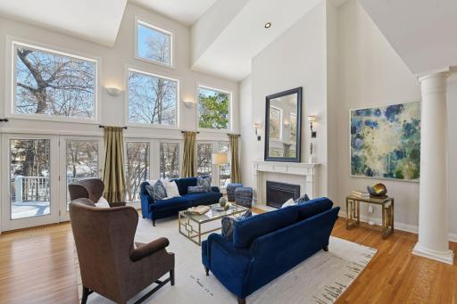 Windows line the east wall of the Great Room, casting beautiful light deep into the home.