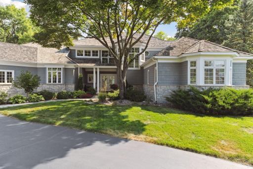 This coastal-inspired, shingle-style home is beautifully positioned on a 3/4 acre lot, at the heart of the Gideon's Point neighborhood.