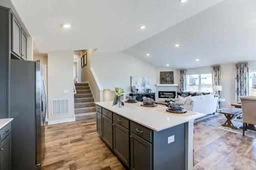 Bright and spacious feeling with big vaulted ceiling. Colors and options will vary.