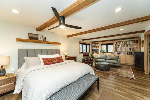 Primary bedroom suite w/lounge area + library
