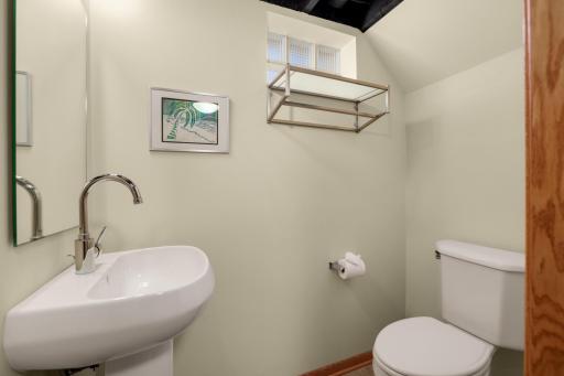 Half bathroom located in the lower level entry mudroom. (remodeled in 2013)