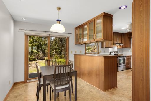 Dining room with sliding patio door to the backyard.