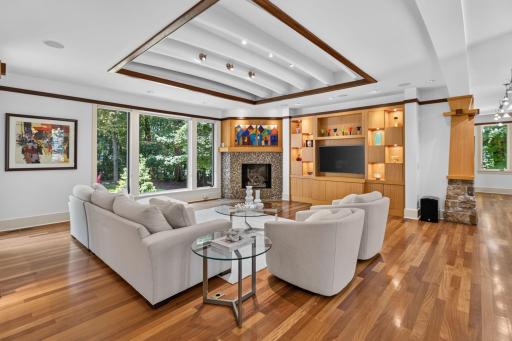 Main level living room with views of the backyard