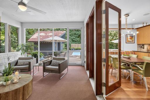 3 seasons porch opens to the backyard and pool