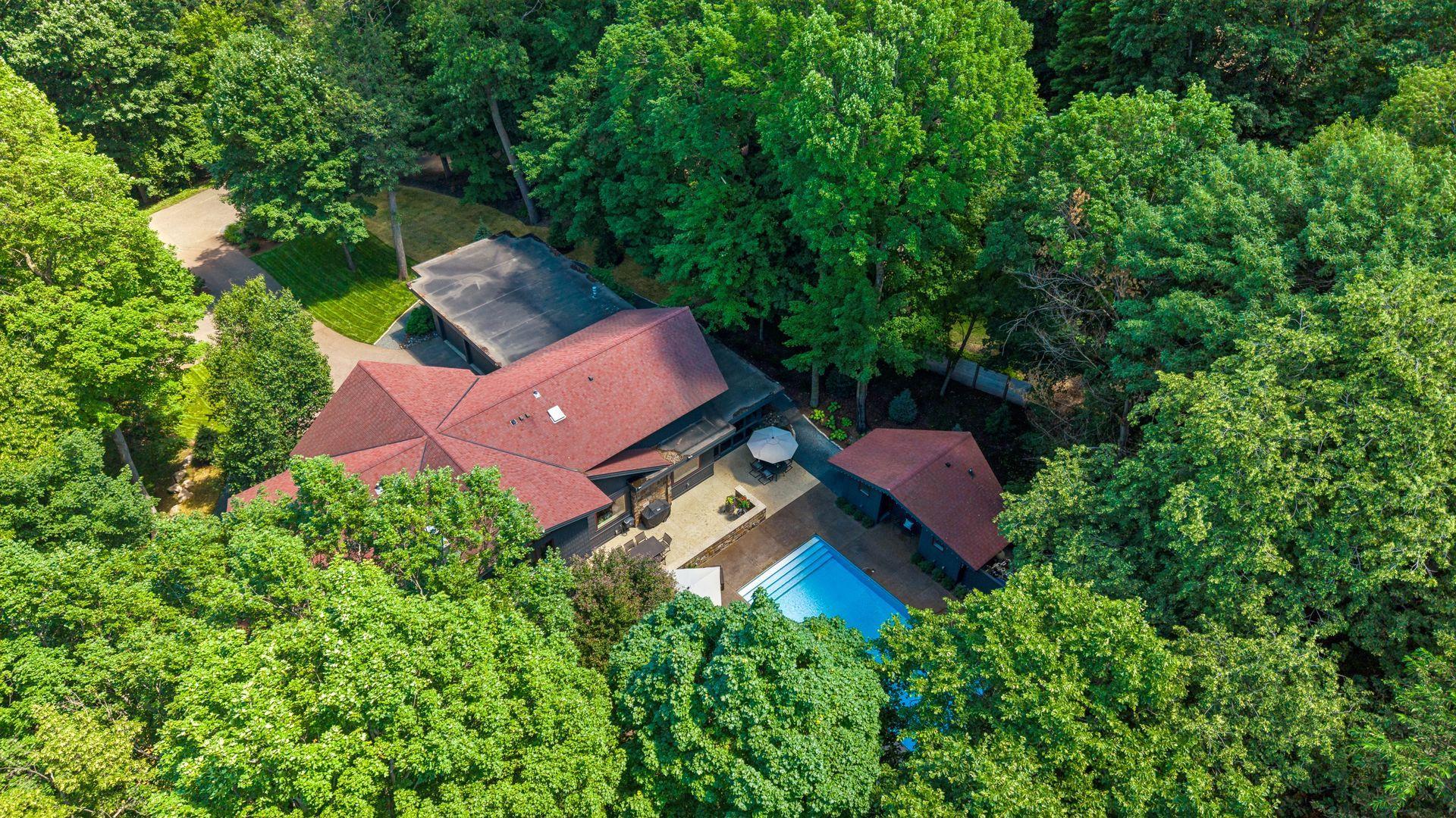 Private oasis surrounded by mature trees