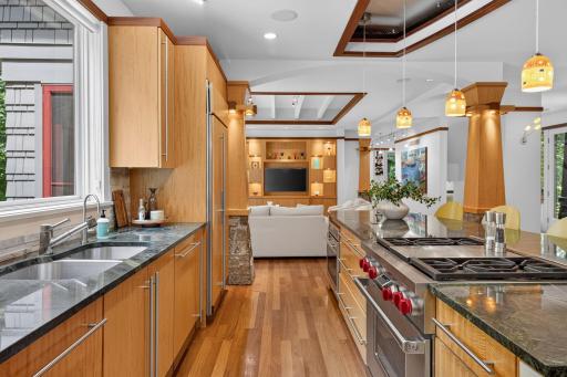 The kitchen features 2 Wolf ranges and 2 dishwashers