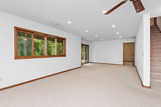 Walkout lower level has a huge family room, recreation room, additional bedroom, 1/2 bathroom, HUGE Storage Space below the entire garage area that can be used for a theatre room, panic room, entertainment area, storage or whatever you wish!