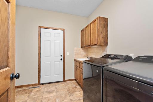 Main level laundry with utility sink