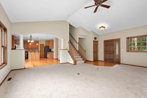 Level Living Room is Open to Dining and Kitchen and lots of windows to enjoy the river views - OPEN FLOOR PLAN!