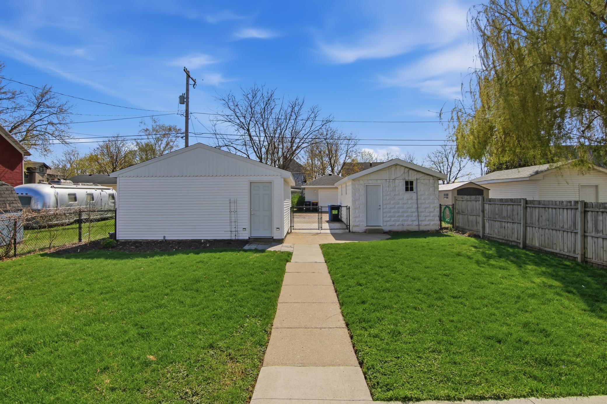 Fenced Backyard & 2 Garages