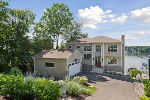 Attached and heated 2 car garage plus addtional 3 car garage for cars and toys!