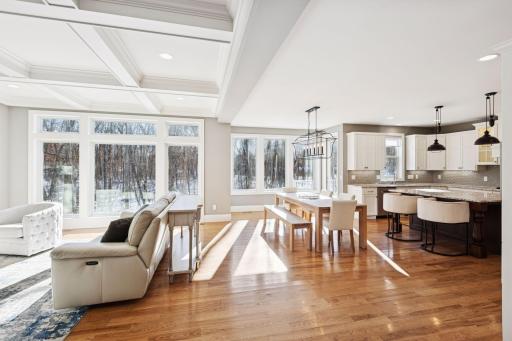 Right when you walk in, you're invited by the floor to ceiling windows of wooded privacy.