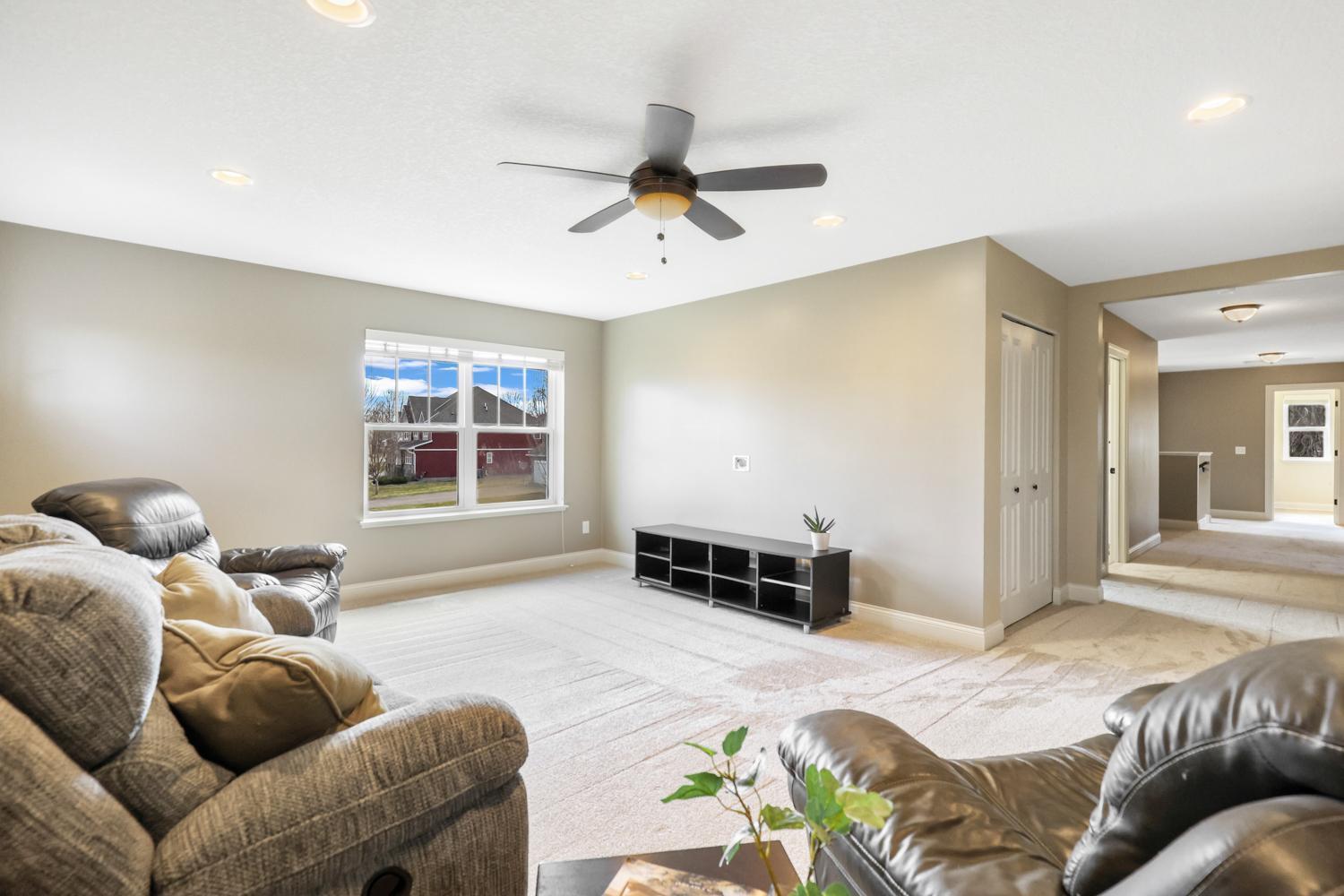 Upstairs living room ready for entertainment center or games for everyone to enjoy!