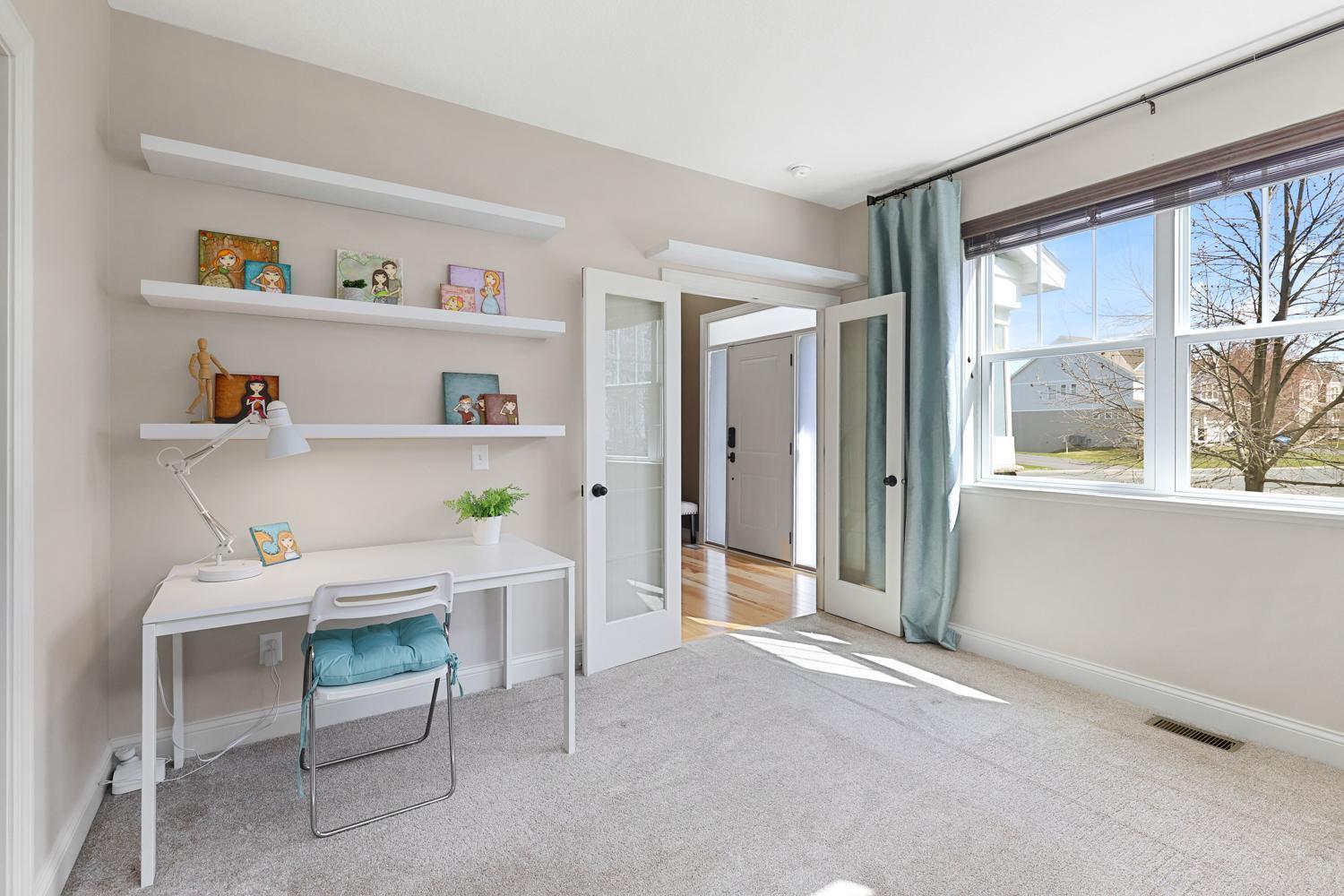 Main level bedroom that brings in natural light