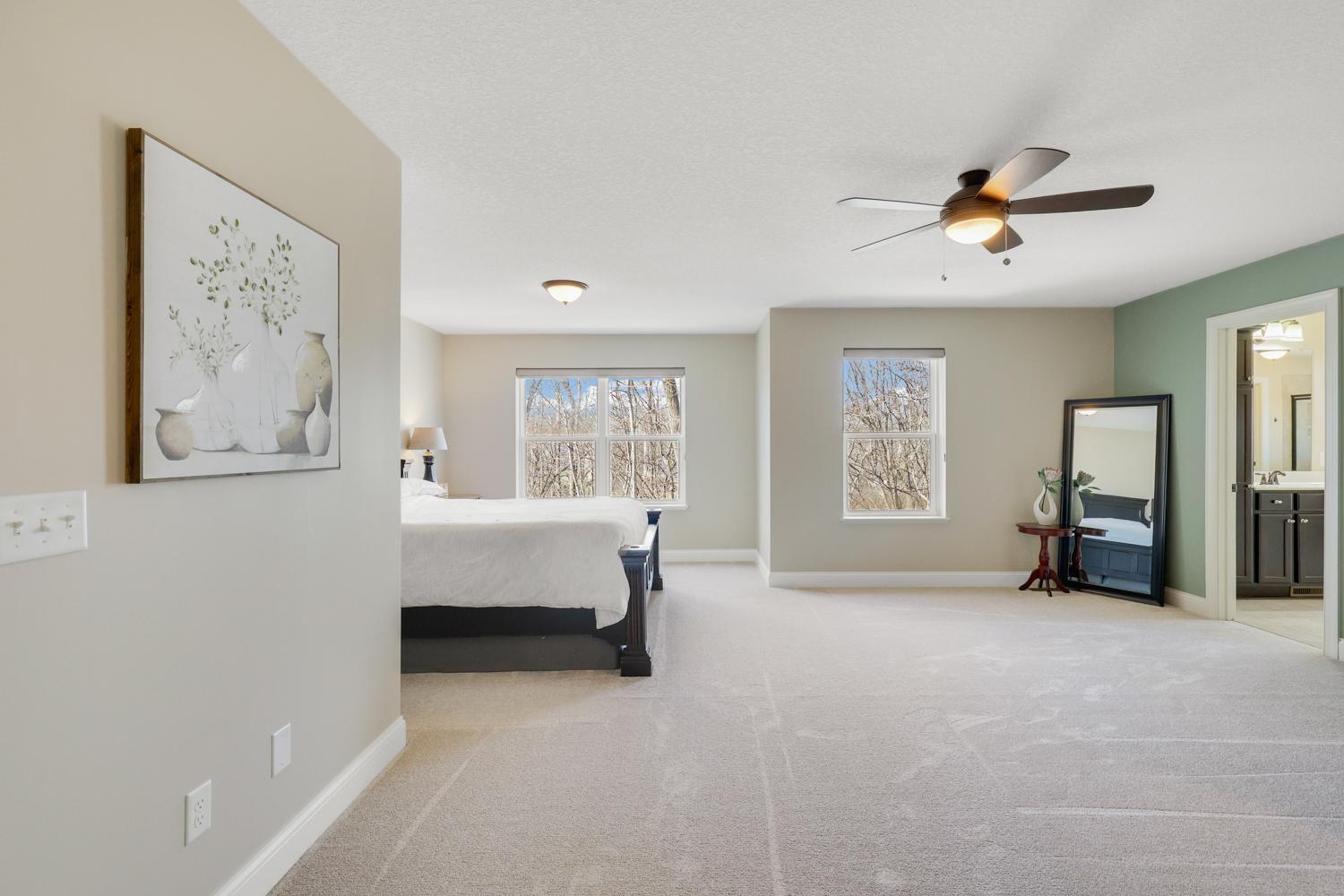 Extra large primary bedroom with plenty of room for a sitting space