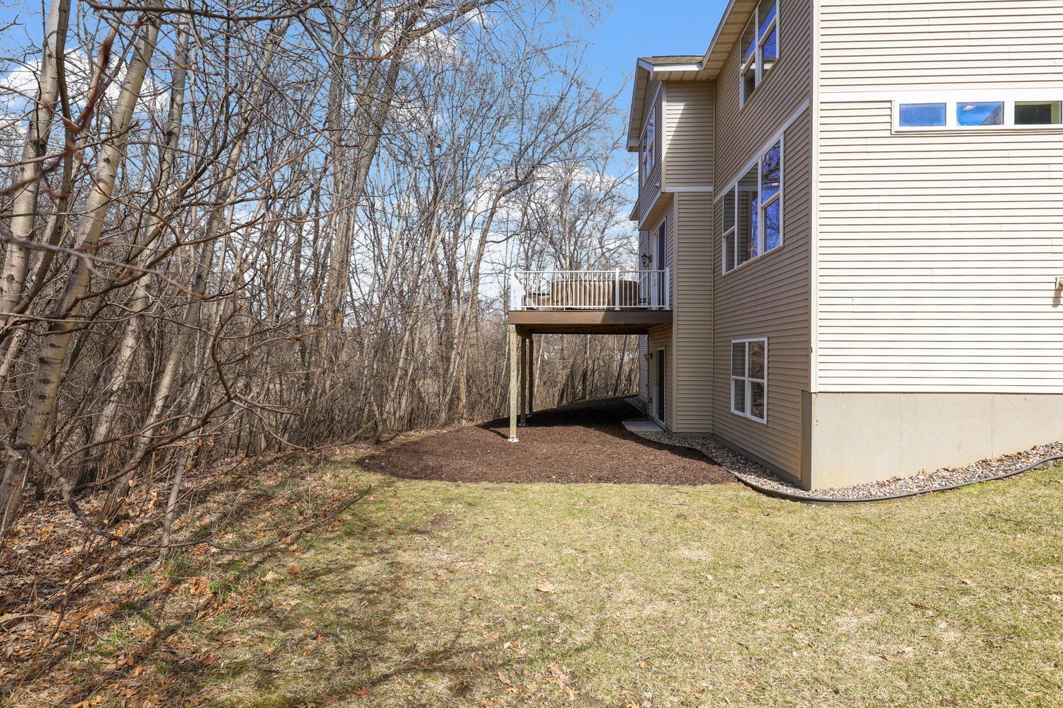 grass that leads to peaceful and private wooded area