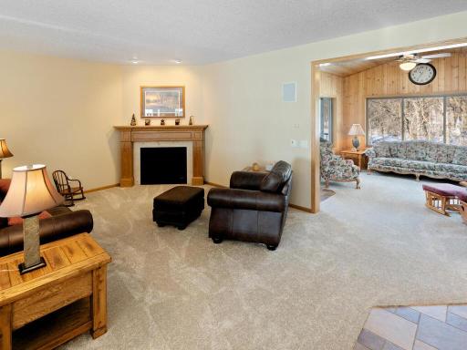 Cozy up to the fireplace in the living room.