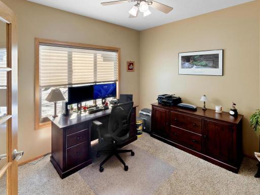 Office on main floor with glass french doors