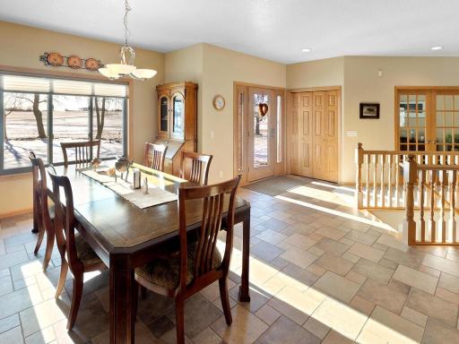 Open concept floor plan with dining room off front foyer